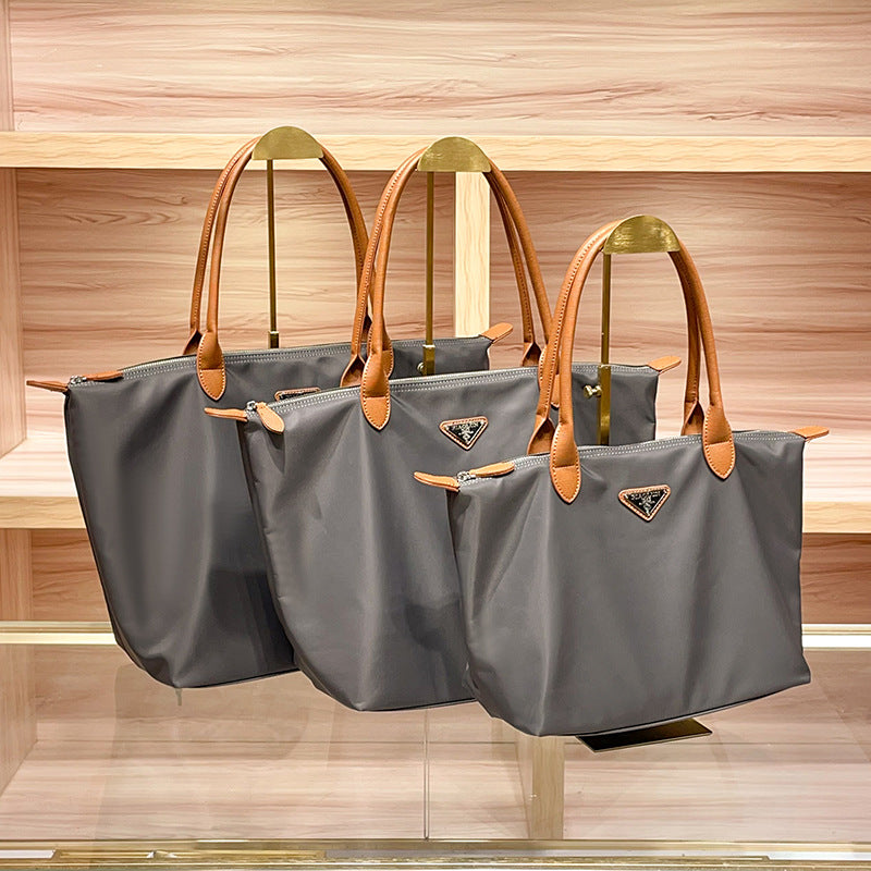 Glamorous Imported Nylon Cloth With Leather Handbags