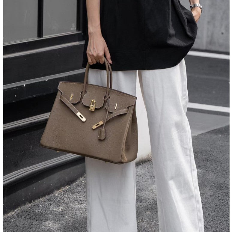 Women's Retro Fashion First Layer Cowhide Genuine Leather Handbags