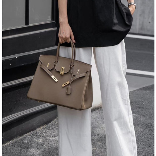 Women's Retro Fashion First Layer Cowhide Genuine Leather Handbags