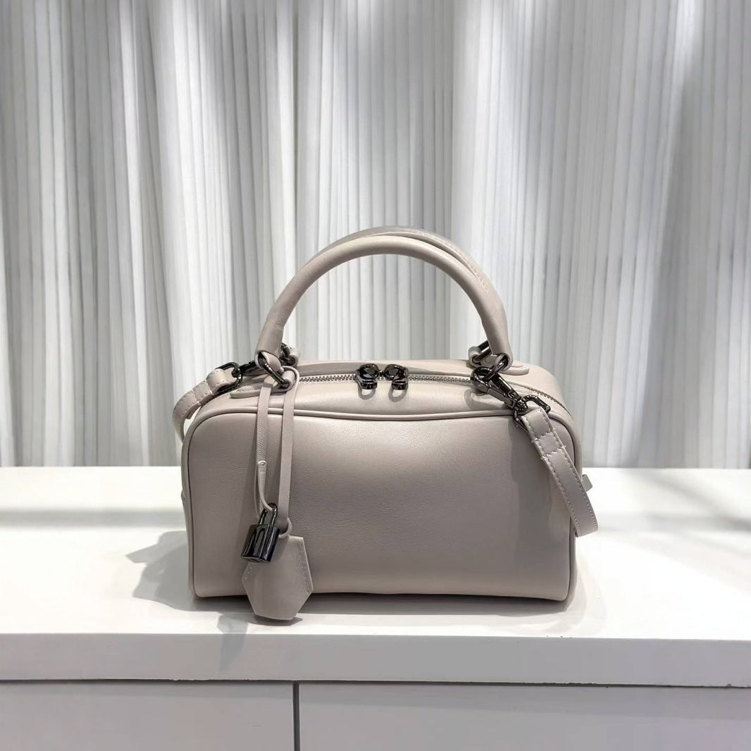 Women's Lambskin Portable Fashion Simple Latch Design Handbags