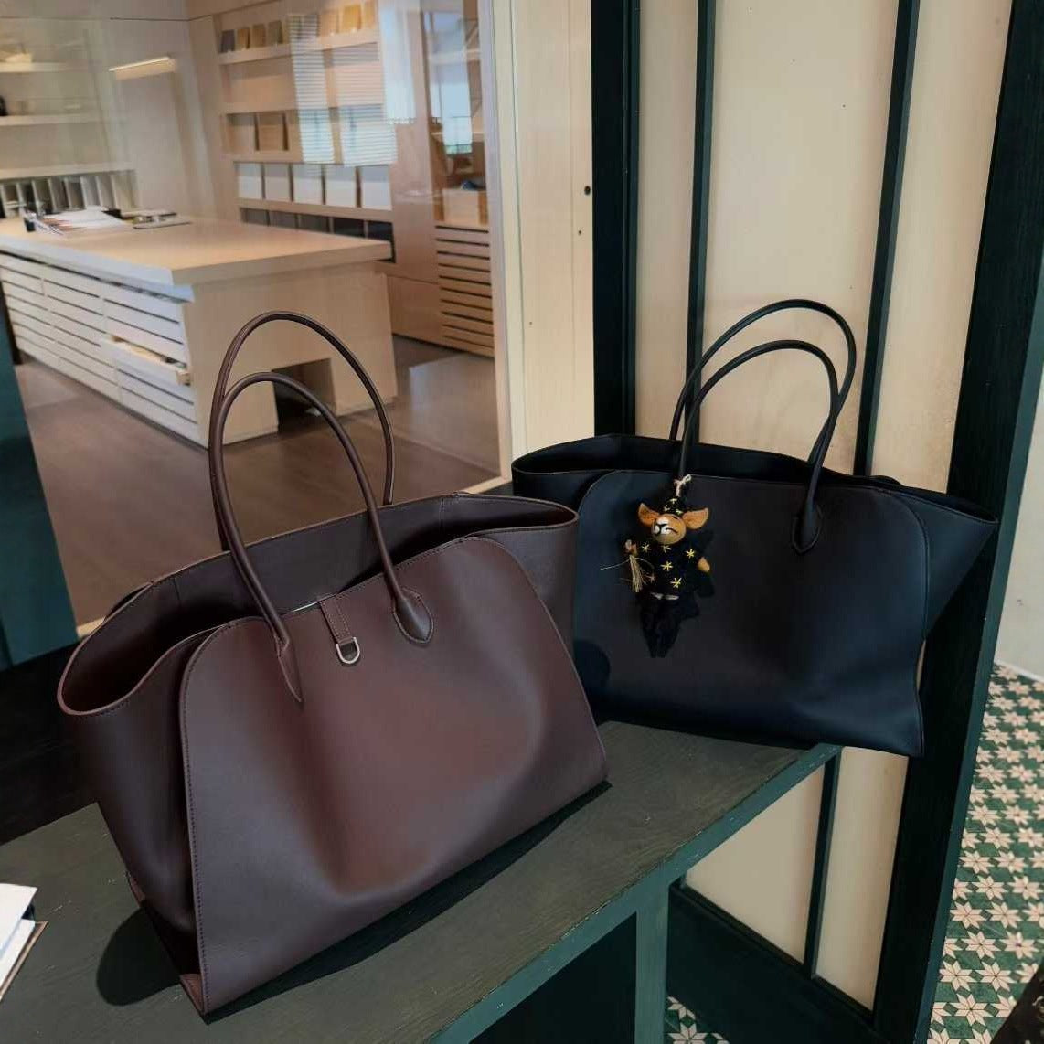 Women's Cowhide Trendy Simple Commuter Long Large Handbags