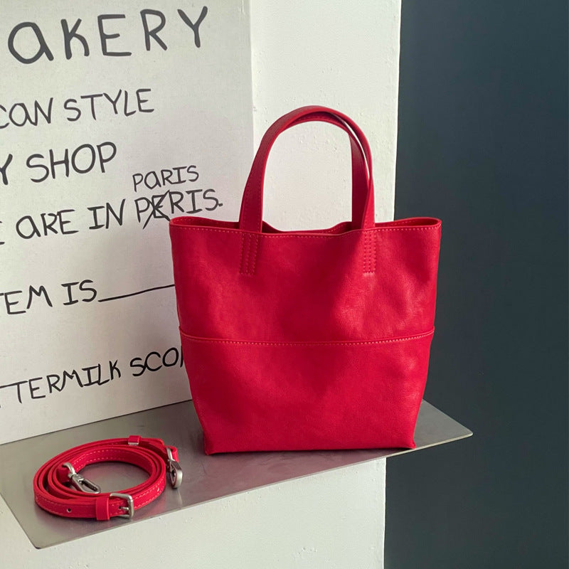 Women's Soft Texture Cowhide Minimalist Hand Wings Handbags