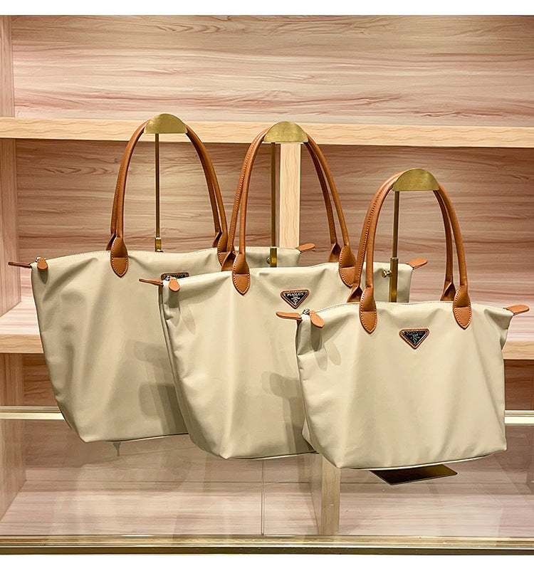 Glamorous Imported Nylon Cloth With Leather Handbags