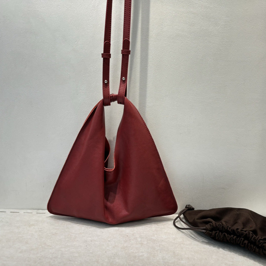 Women's Vegetable Tanning Leather Triangle Genuine Cloud Handbags