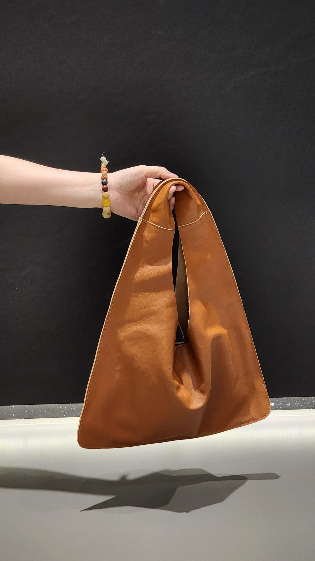 Women's Vegetable Tanning Leather Triangle Genuine Cloud Handbags