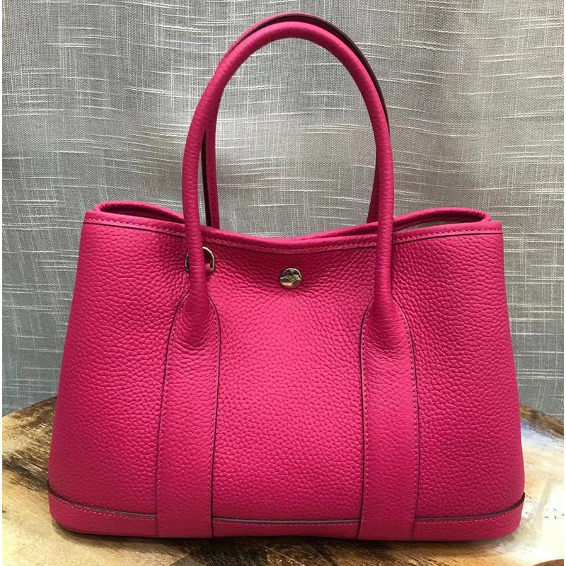 Women's Pattern First Layer Cowhide Genuine Leather Handbags