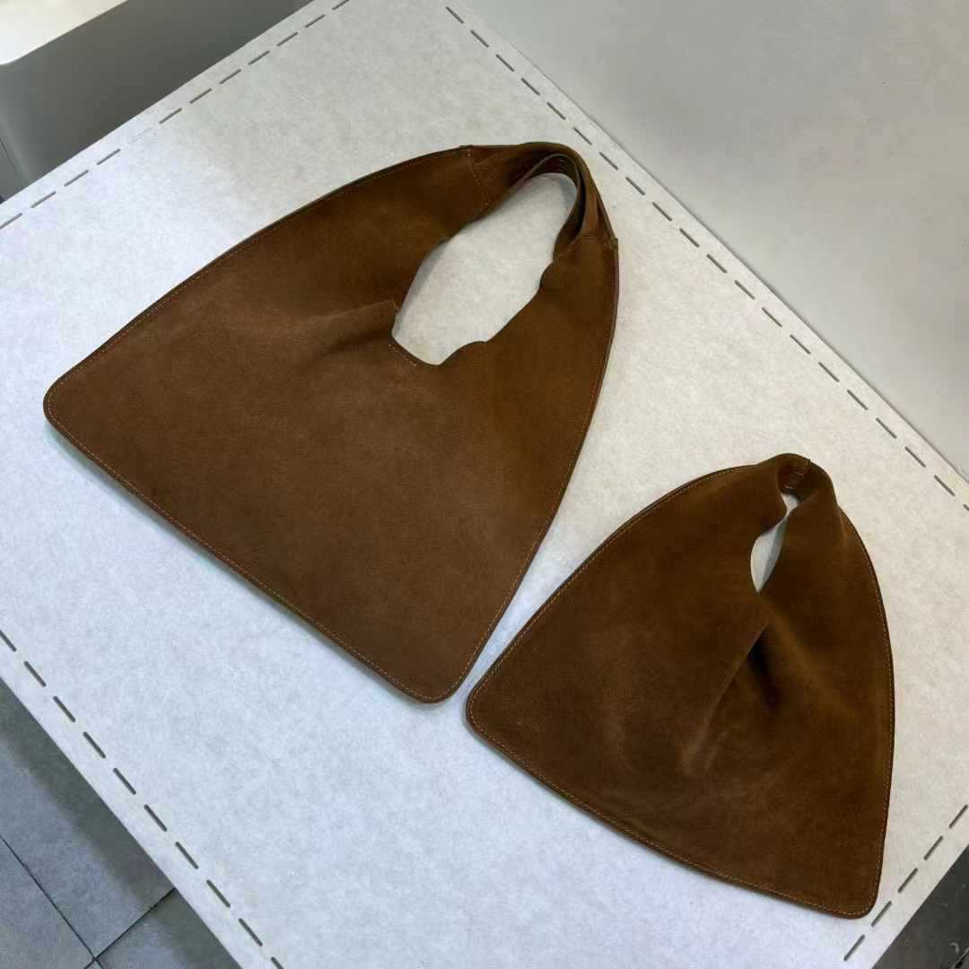 Women's Vegetable Tanning Leather Triangle Genuine Cloud Handbags