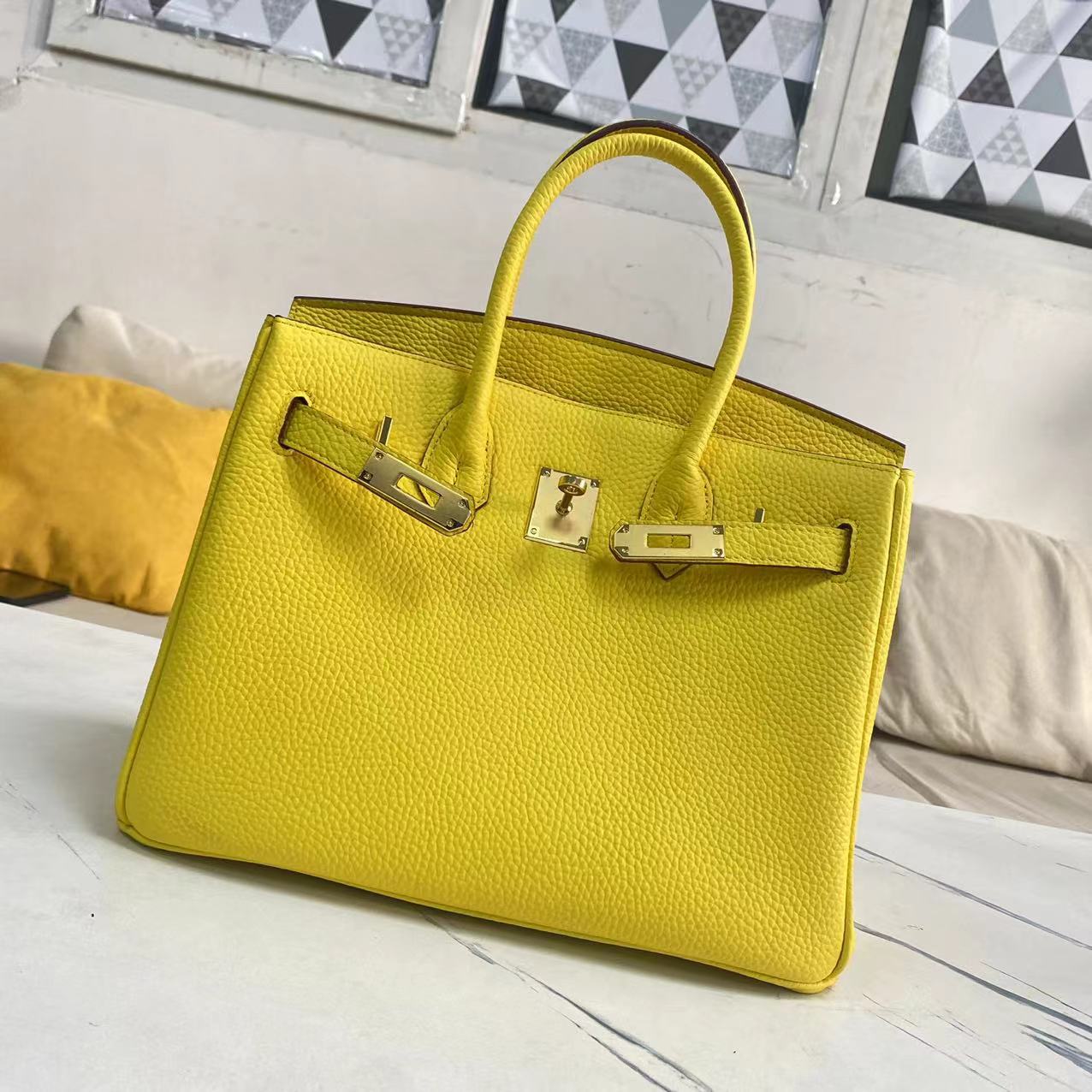 Women's Litchi Grain Cowhide First Layer Kelly Handbags