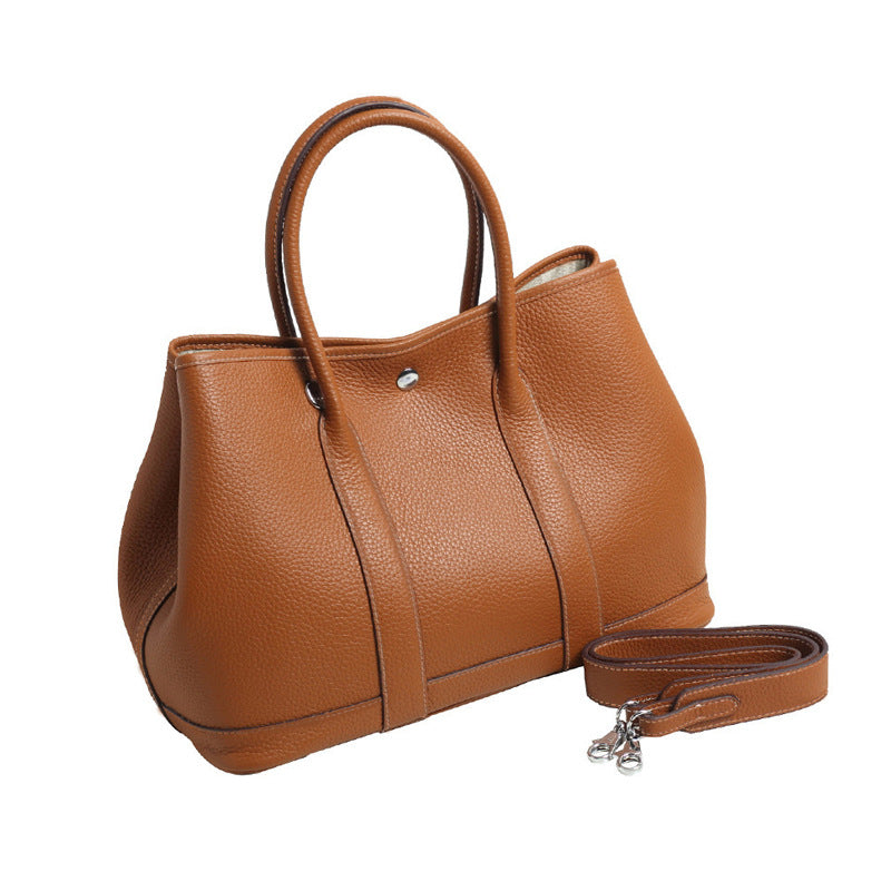 Women's Pattern First Layer Cowhide Genuine Leather Handbags