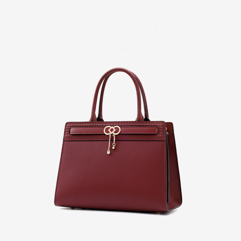 Women's Solid Color Art Design Fashion Hardware Handbags