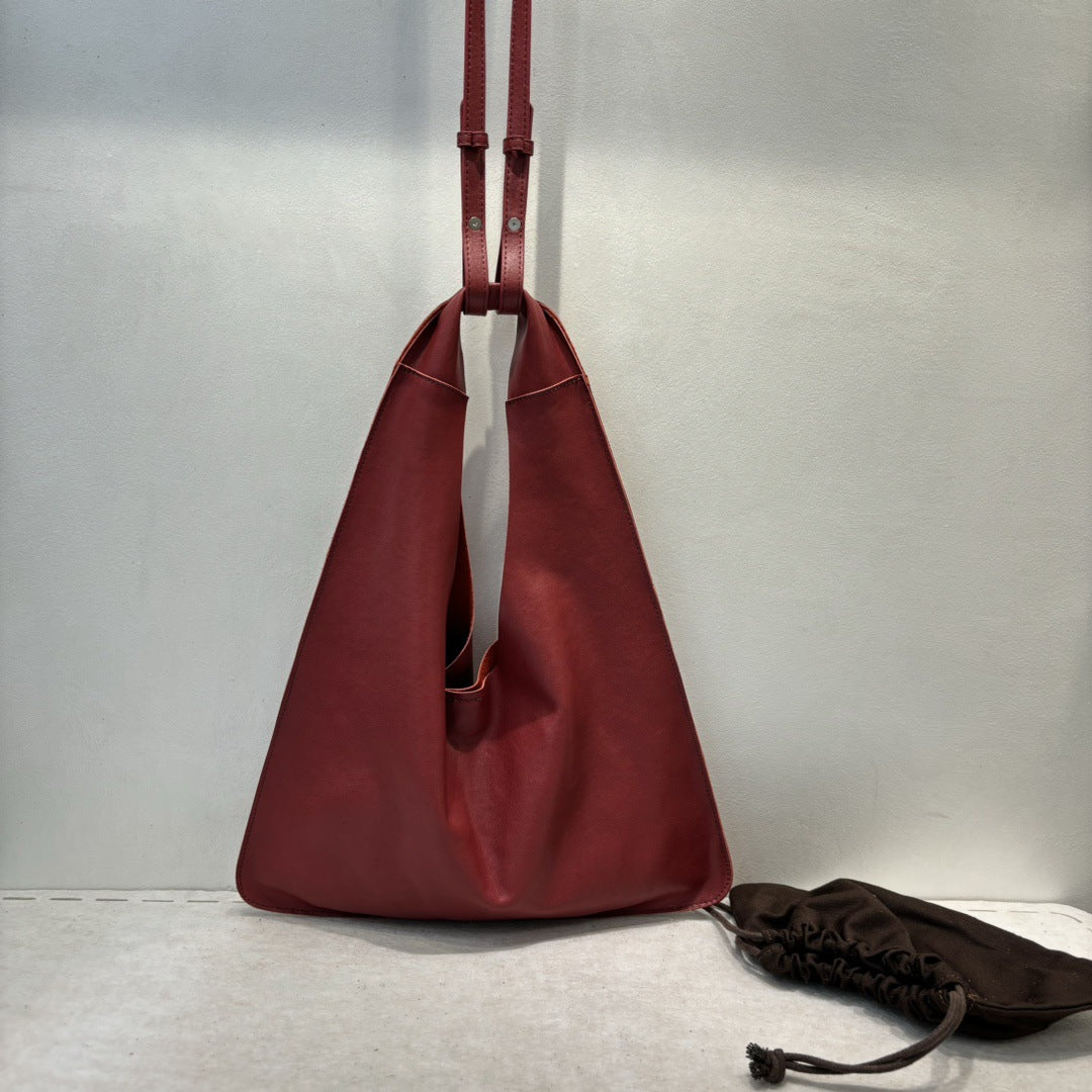 Women's Vegetable Tanning Leather Triangle Genuine Cloud Handbags