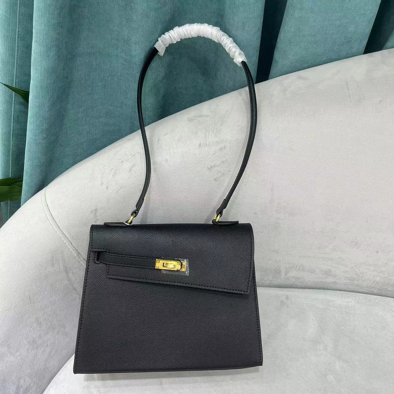 Women's Genuine Leather Elegant Simple Trendy Commuter Handbags