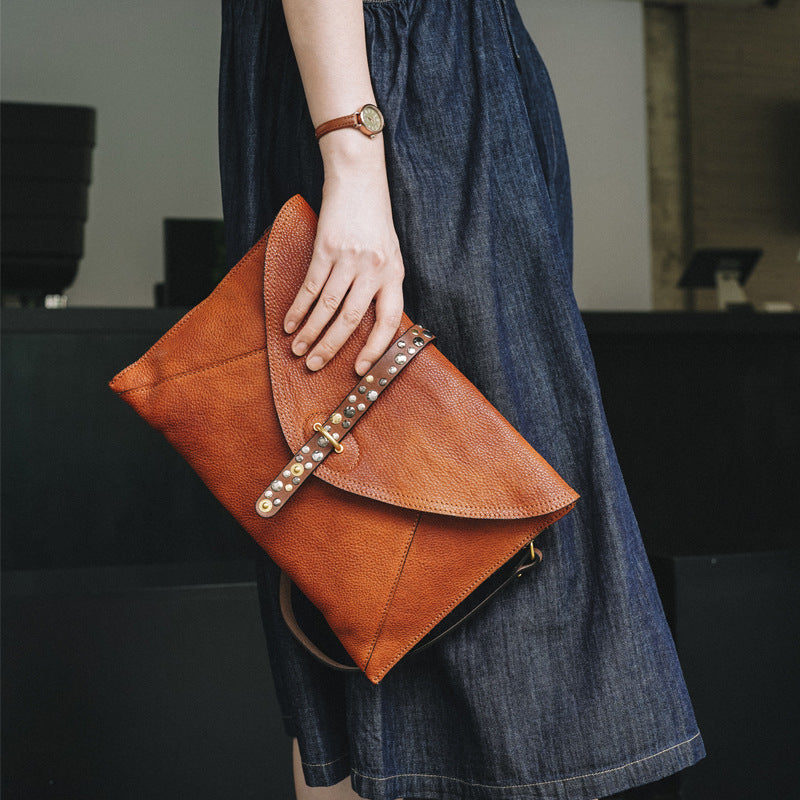 First Layer Cowhide Texture Rivet Niche Clutch Cover Bags