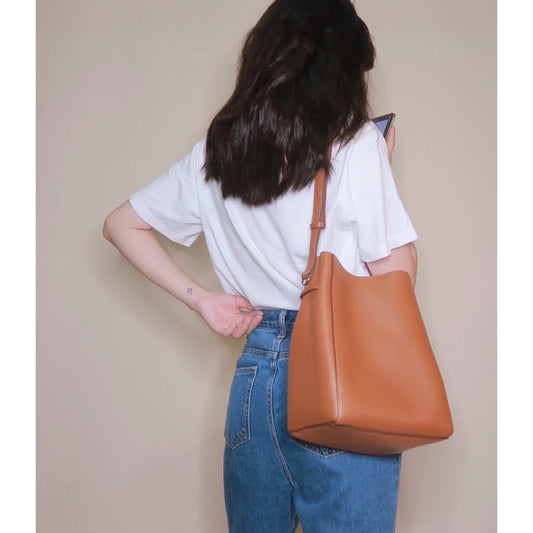 Women's Niche Designer Hand-held Drawstring First Layer Shoulder Bags