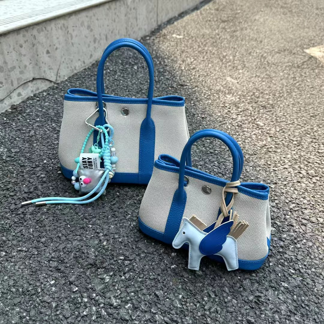 Women's Canvas With First Layer Cowhide Handbags