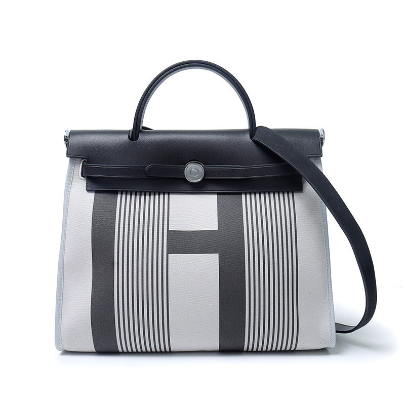 Women's Cowhide Canvas Portable Advanced Genuine Leather Handbags